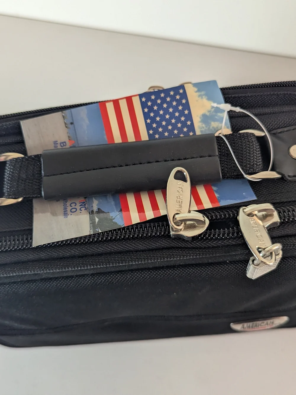 New with tags American Uni travel laptop and document organizer bag in black.